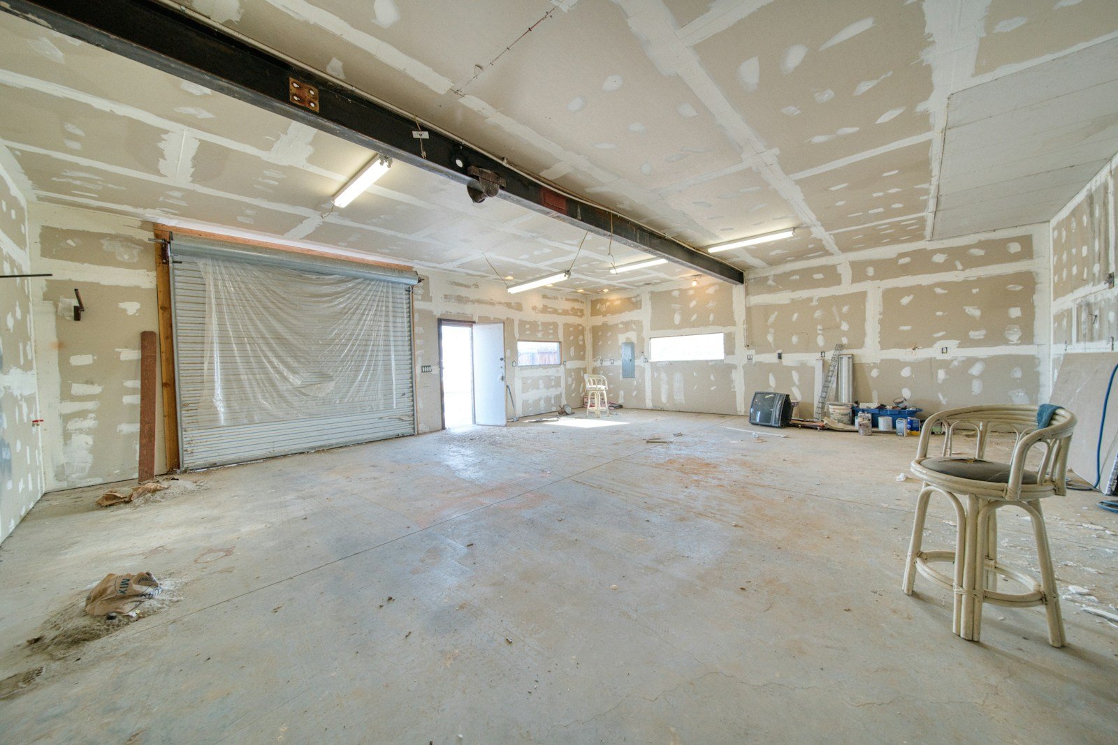 Photo by Brian Wangenheim A large room with a lot of white paint on the walls